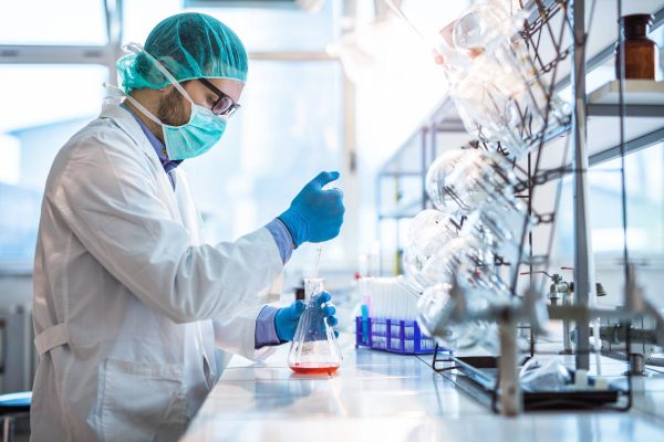 male-scientist-testing-substance-lab-966765790-min